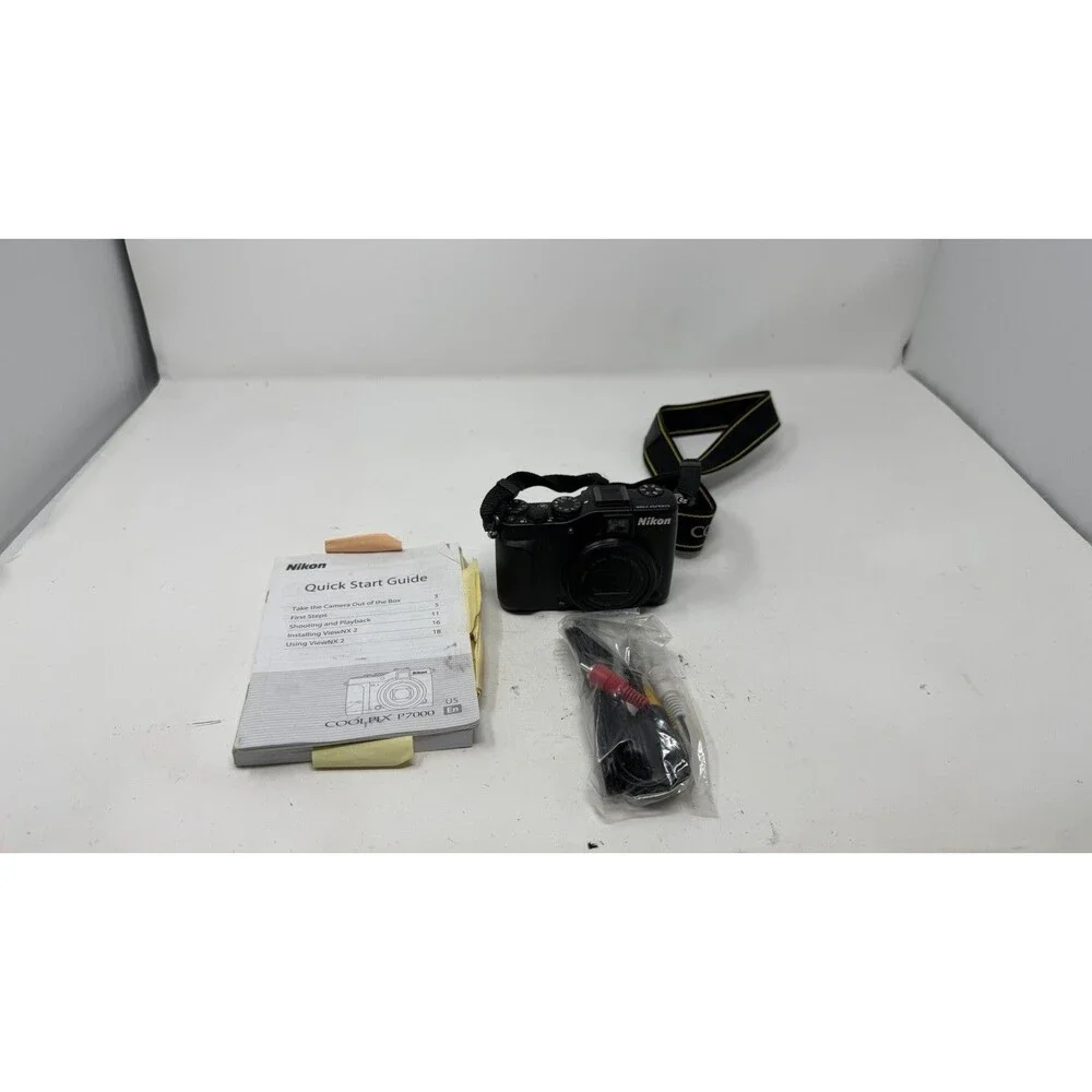 Nikon COOLPIX P7000 10.1MP Compact Digital Camera with Battery, Charger & Manual